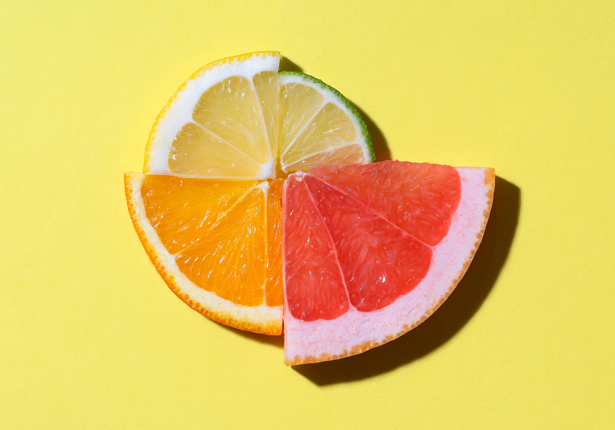 Citrus Fruits Slices in Sunlight. Summer Fruits Context